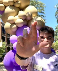 Will Driver uses the "Roar Lions" hand sign that he created.