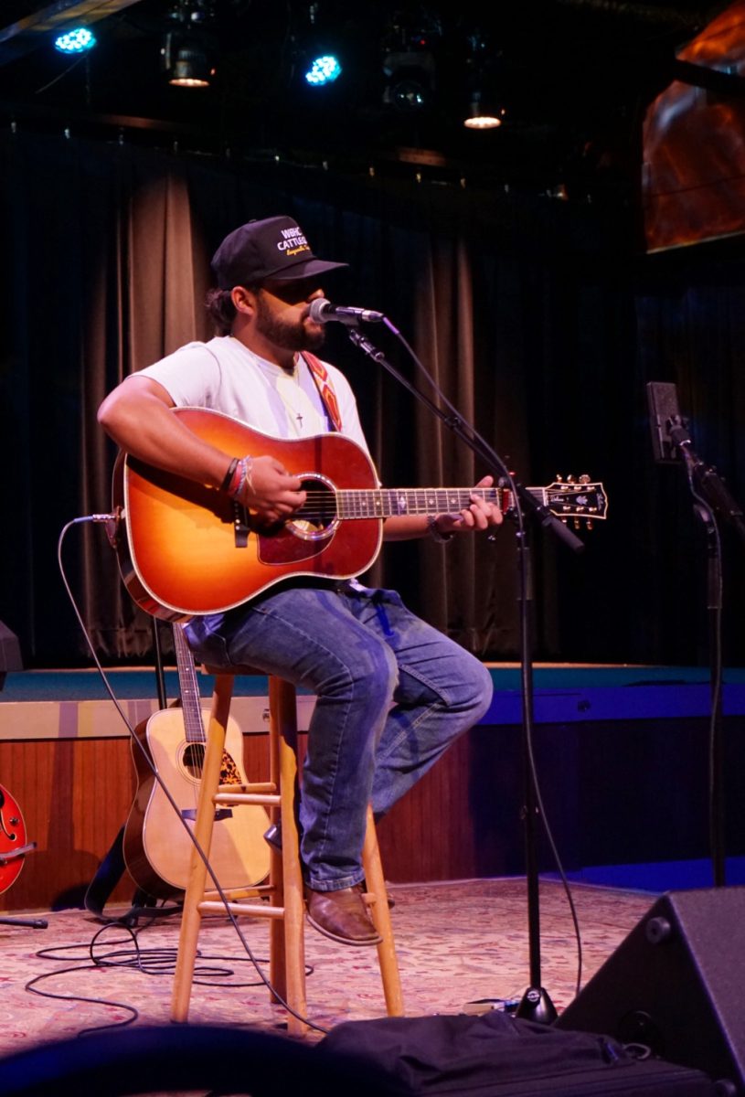 Luke Zellner performs an original song.