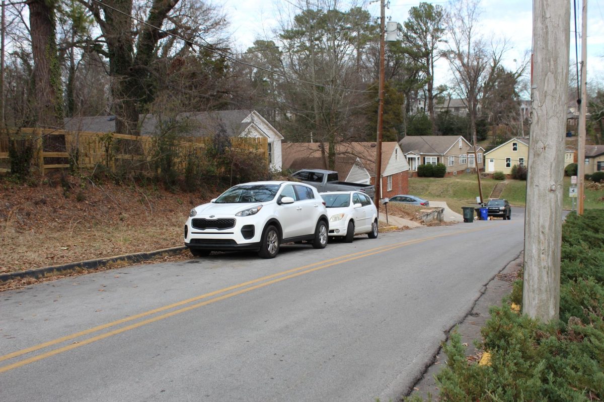 Many on-campus and off-campus resident students have long used sections of West Hawthorne St. to park their cars. 