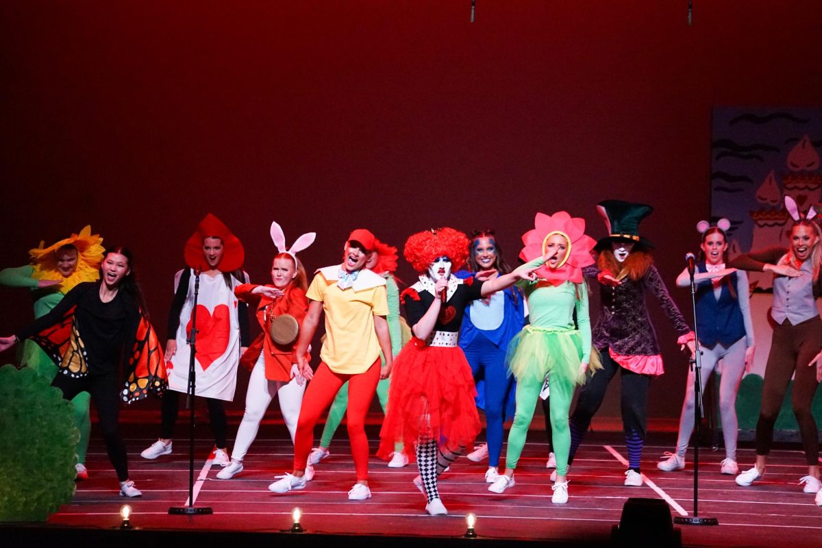 Alpha Gamma Delta performs “Alpha Gam in Wonderland” at Norton Auditorium.