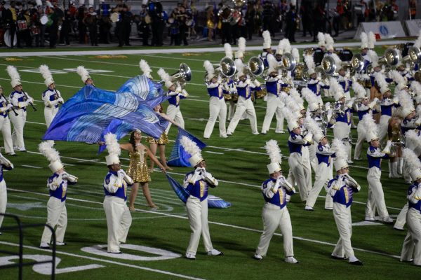 University of North Alabama Marching Pride performs at football game half-time show.