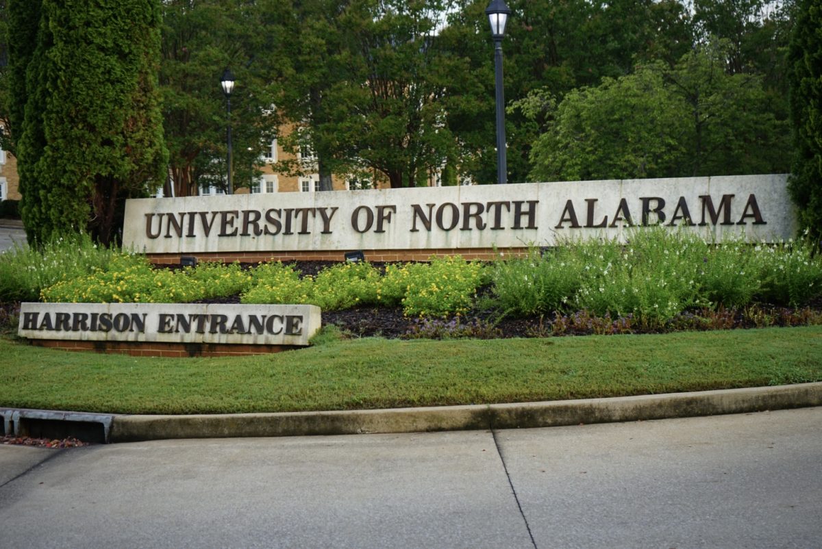 A sign that reads "University of North Alabama Harrison Entrance." 
